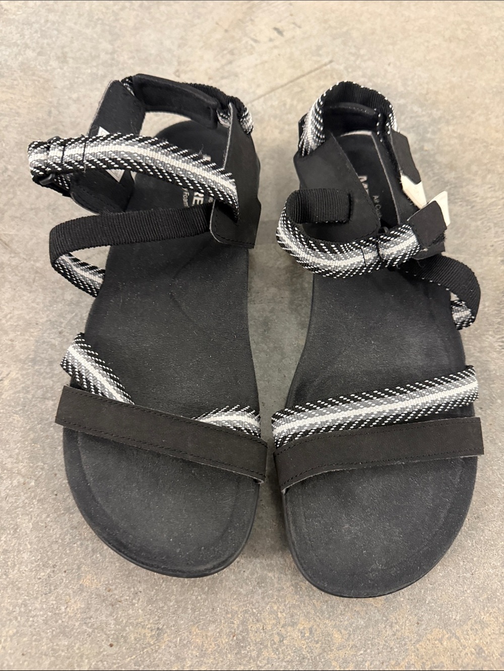 Merrell Black Women's Strappy Sandals with White-Trim Accents